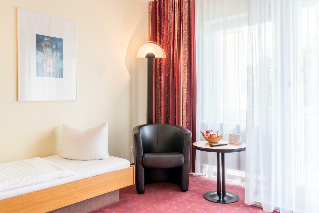 Dreibettzimmer mit Balkon